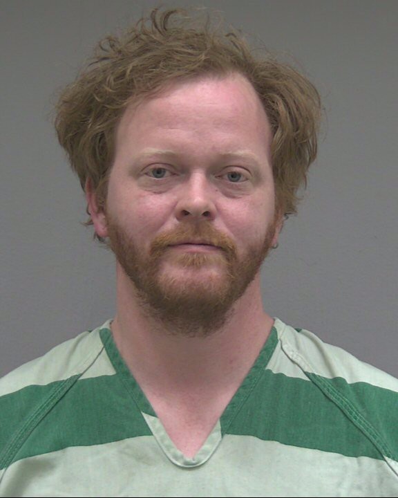 Booking photograph for JOSHUA TAYLOR HUEY