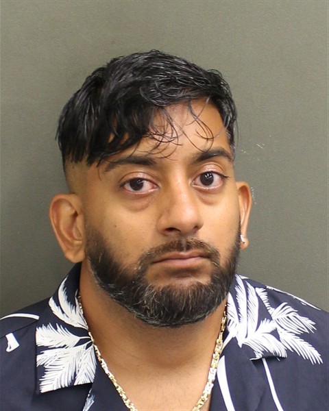 Booking photograph for RICKY ASRULA