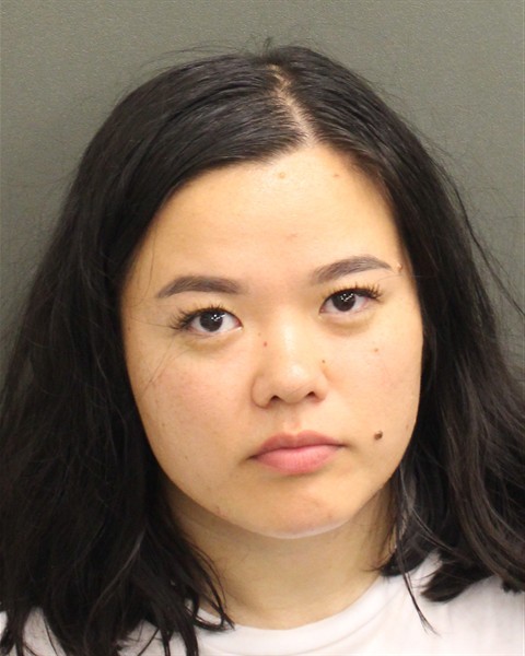 Booking photograph for MADINABON SOLIJONOVA