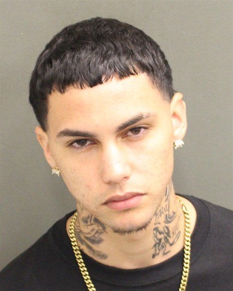 Booking photograph for CESAR NIKOLAS ROCHA