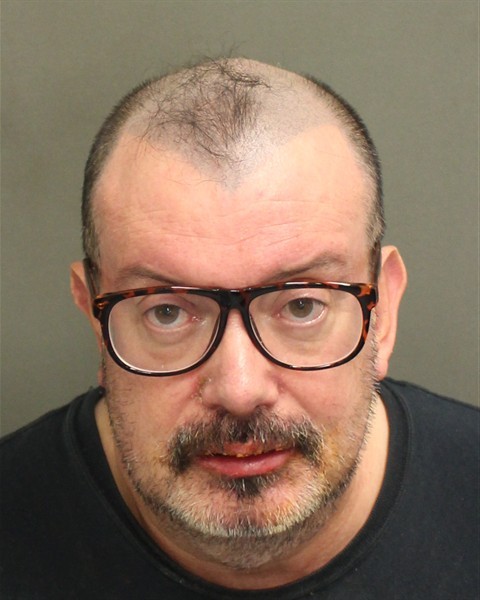 Booking photograph for CARLOS BOTERO