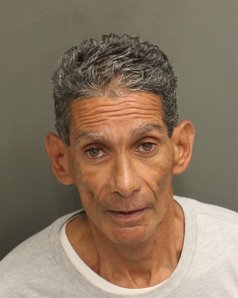Booking photograph for MIGUEL A JR JR CARRION