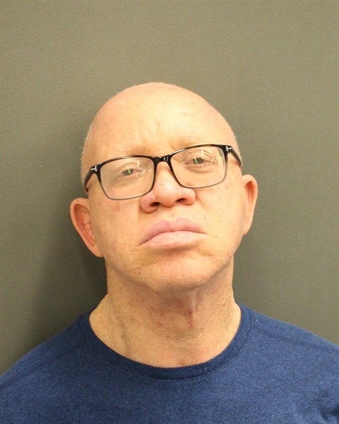 Booking photograph for MICHAEL AKPEKE