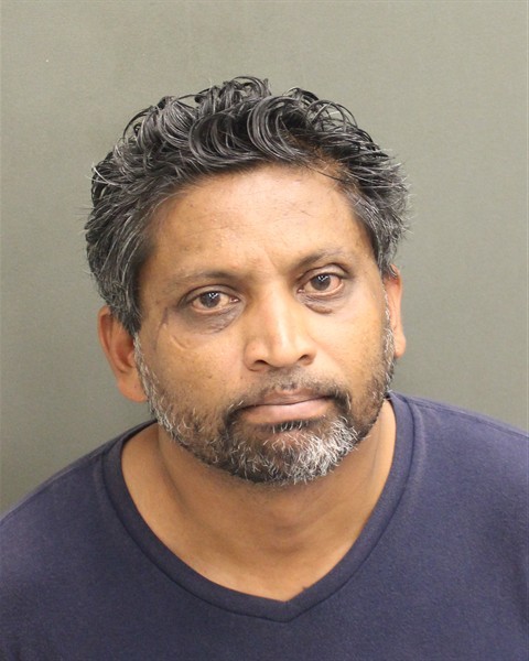 Booking photograph for DHANRAJ HARRIPERSAD