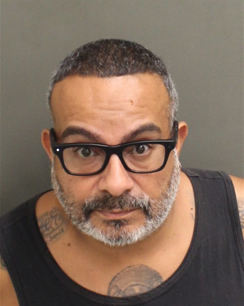 Booking photograph for MELVIN GUZMAN