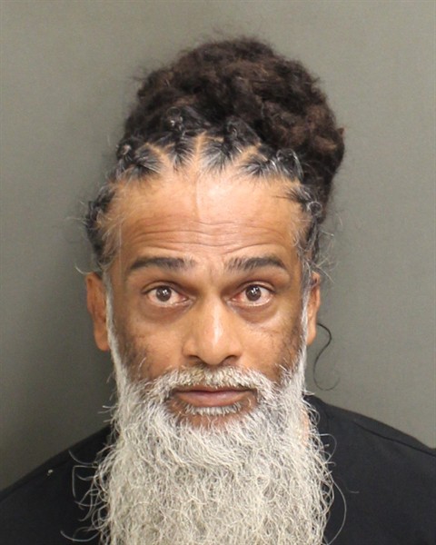 Booking photograph for ANDY MAHARAJ
