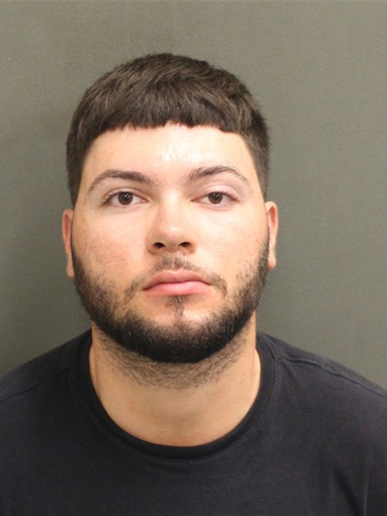 Booking photograph for AXEL MANUEL IRIZARRYROSA