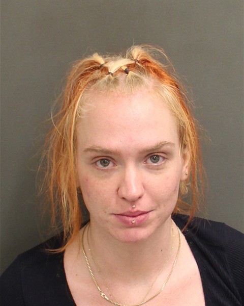 Booking photograph for JENNA REID MCCLURE BROCK