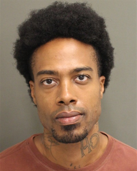 Booking photograph for DEREK CHERIEFF REAVES