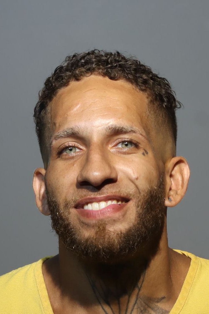 Booking photograph for JUSTIN IVY REA