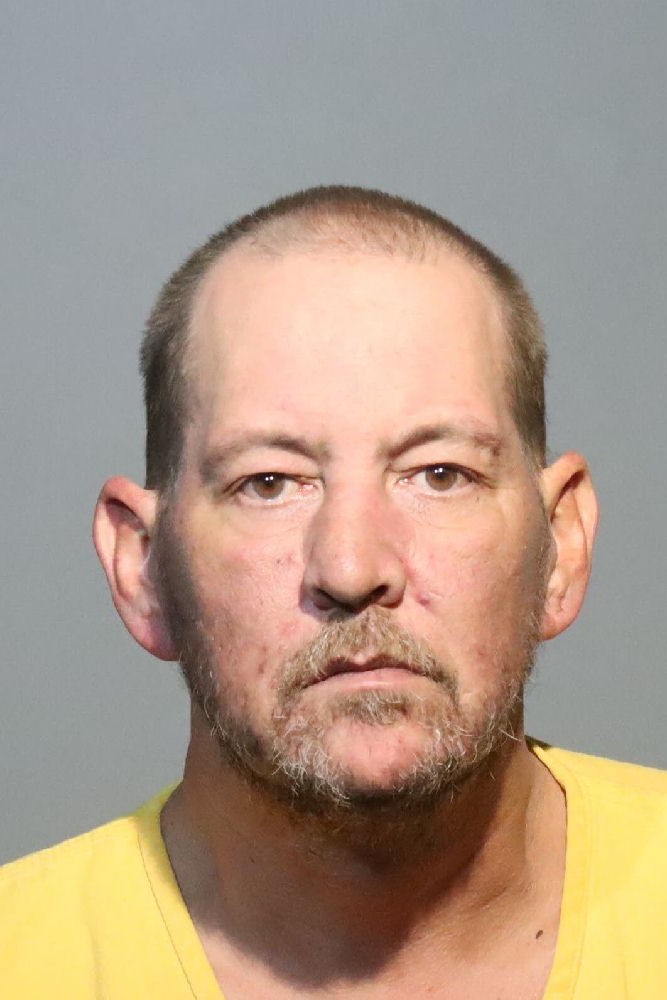 Booking photograph for CHRISTIAN KELLY