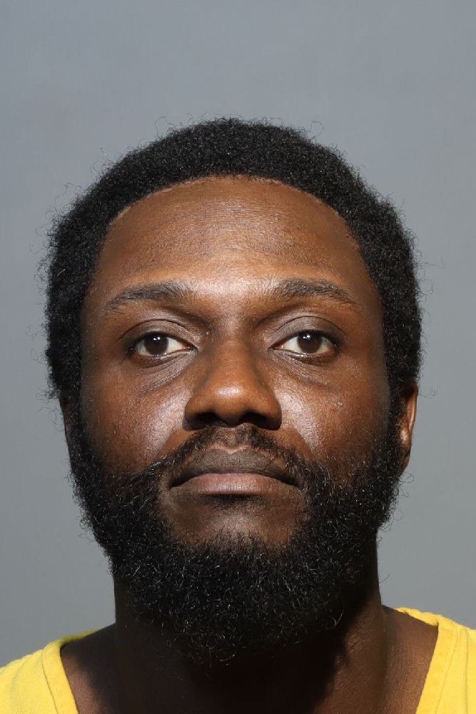 Booking photograph for ABDUL-KAREEM AGBOLADADEMOLA SURAKAT