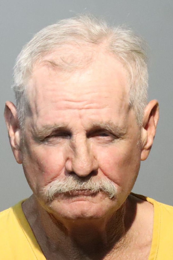 Booking photograph for JOHN ARLO YOUNG