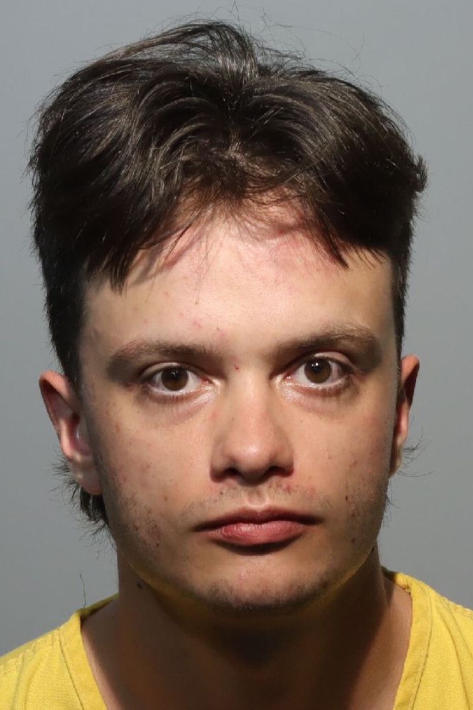 Booking photograph for ERNEST LEE PEGHINY