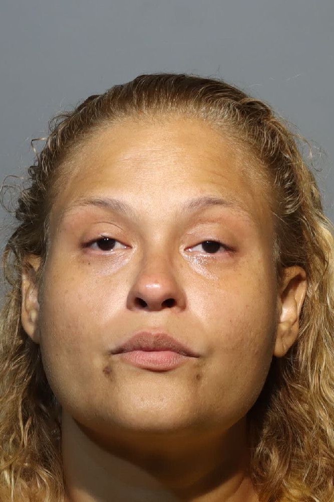 Booking photograph for JEANNIE LISA VELEZ