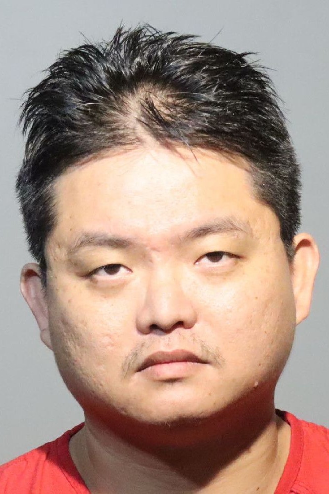 Booking photograph for XIAOWEI LIN