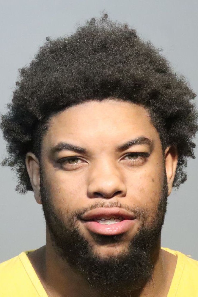 Booking photograph for CALEB JAMAL HUGHES
