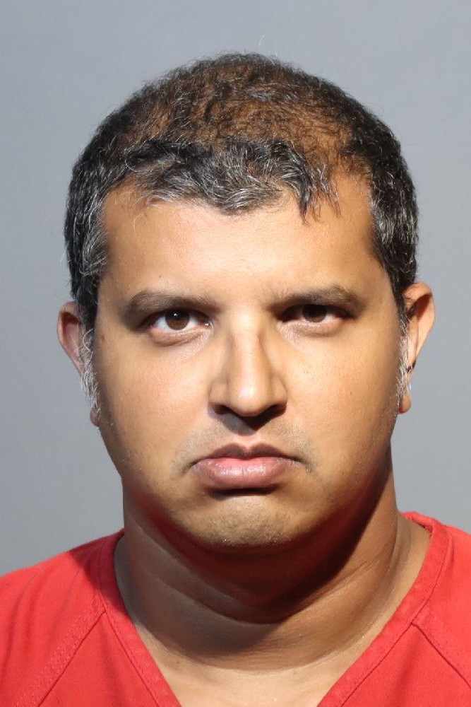 Booking photograph for JAVID KHAN