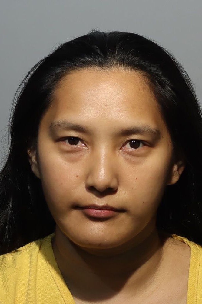 Booking photograph for BERNADETTE LIU DUMBRIQUE