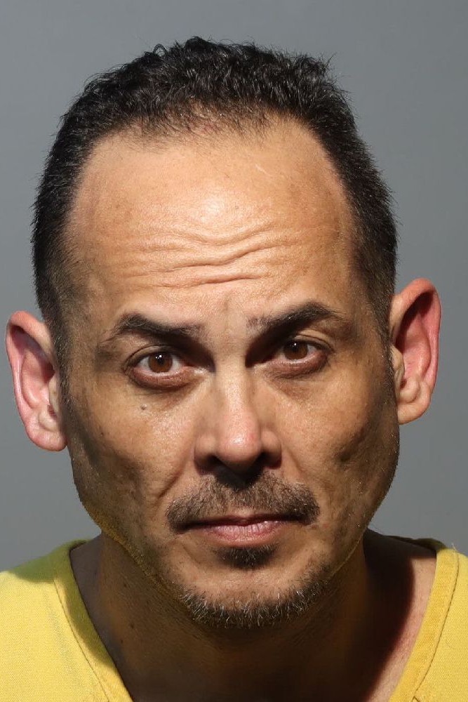 Booking photograph for ROBERTO CARLO ADAIR