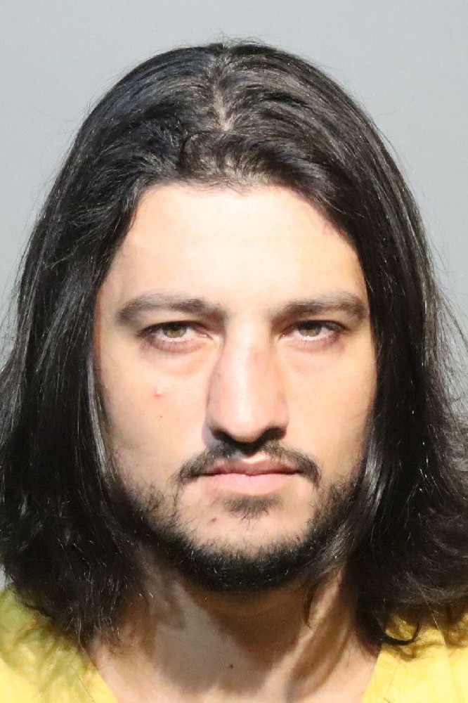 Booking photograph for AHMED ZAMAN KHAN