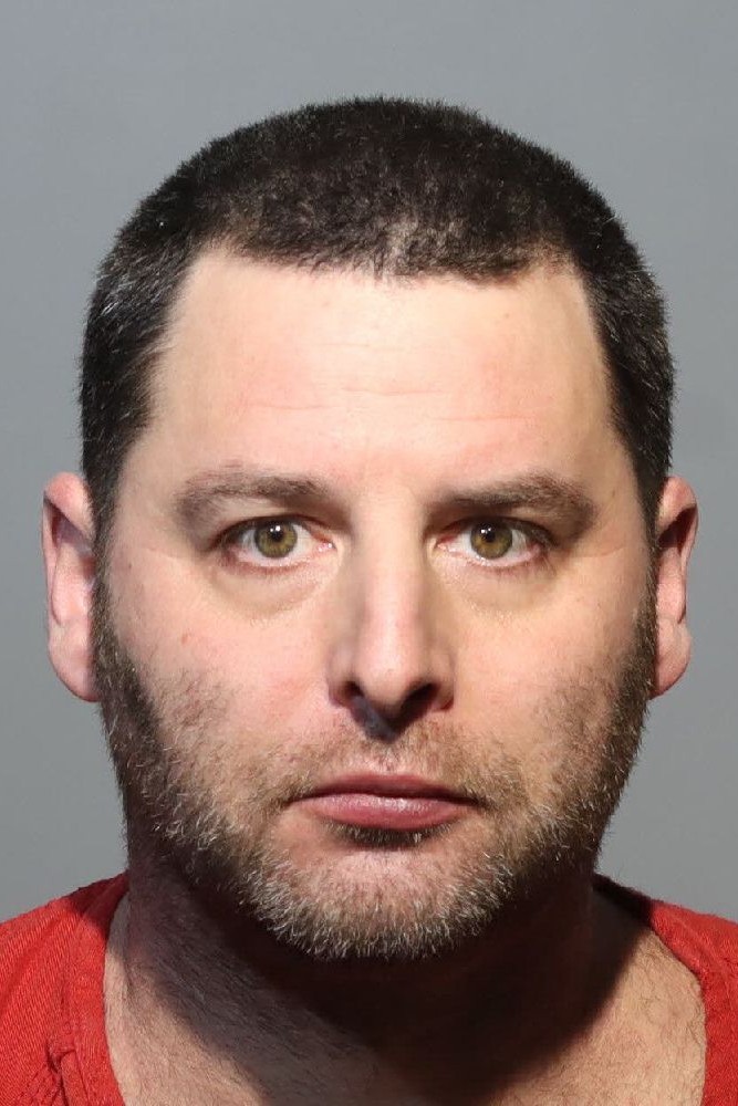 Booking photograph for ERICH SIMARD