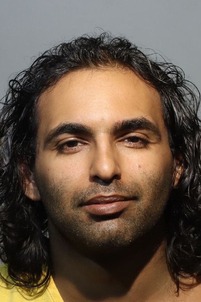 Booking photograph for MAHDI MOHAMMED KASSAM