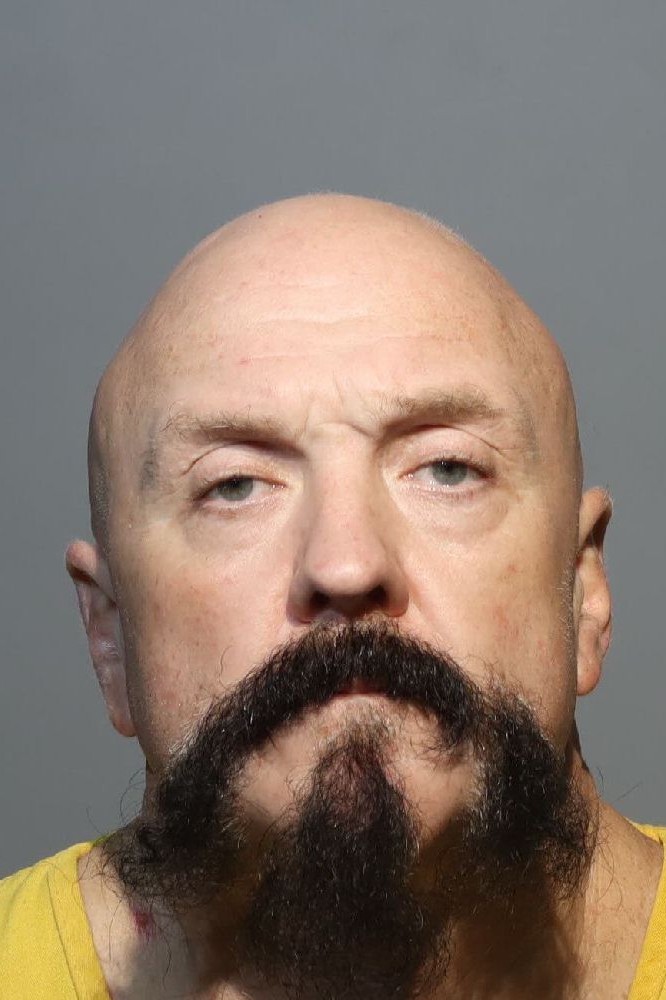 Booking photograph for CHARLES ERNEST HANINGTON