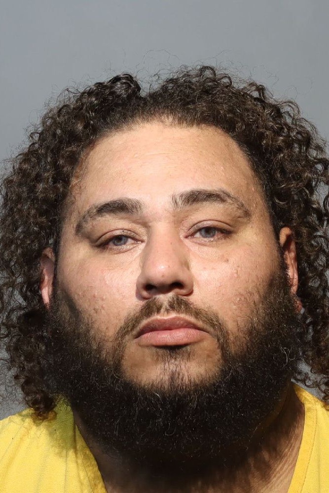 Booking photograph for FRANK MEISHAN CASTELLANOS