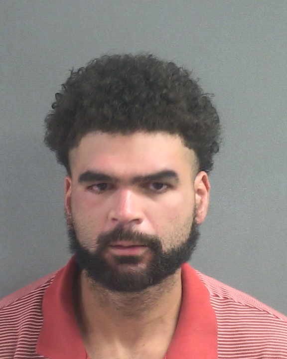 Booking photograph for MILAN JOSEPH BOLIVAR GARCIA