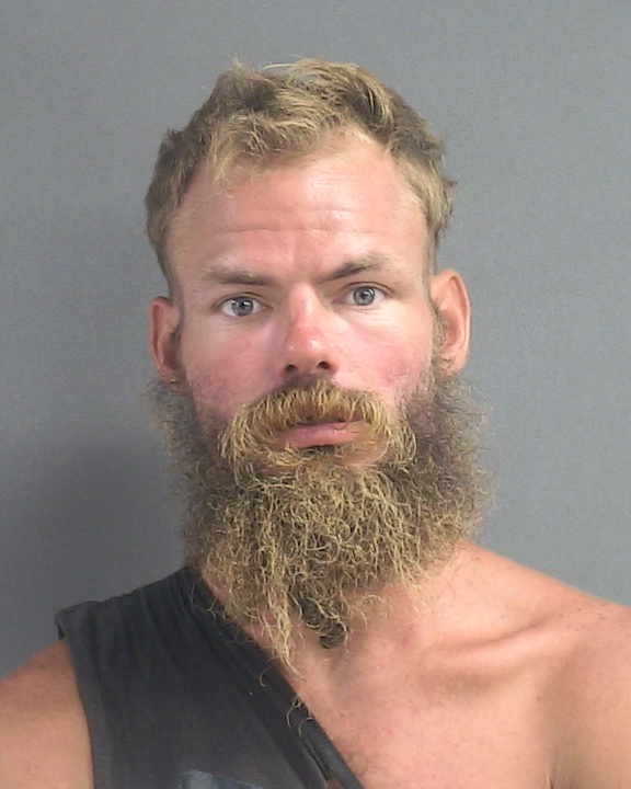 Booking photograph for JOSHUA MICHAEL MOORE
