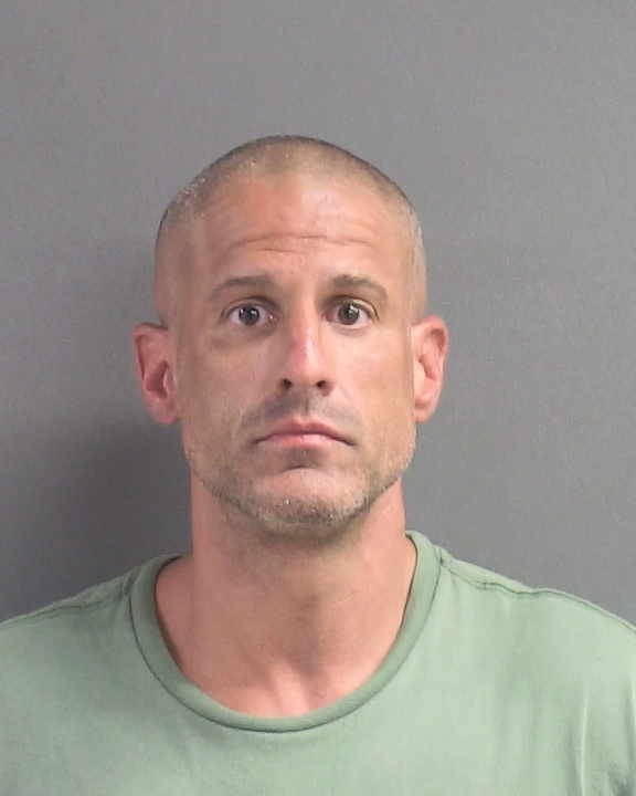 Booking photograph for ADAM LESLIE