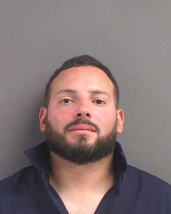 Booking photograph for ROSARIO CHRISTIAN JOEL ROSA