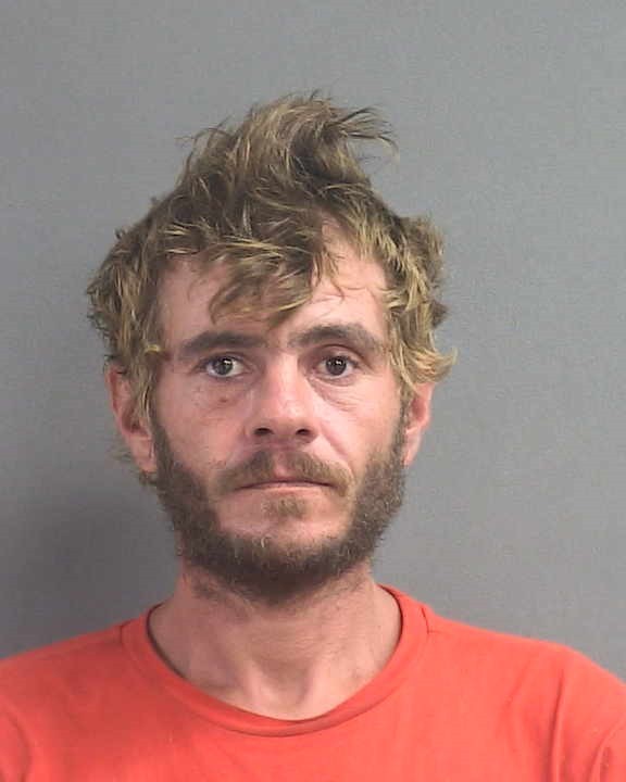 Booking photograph for JOHN MICHAEL GARNER