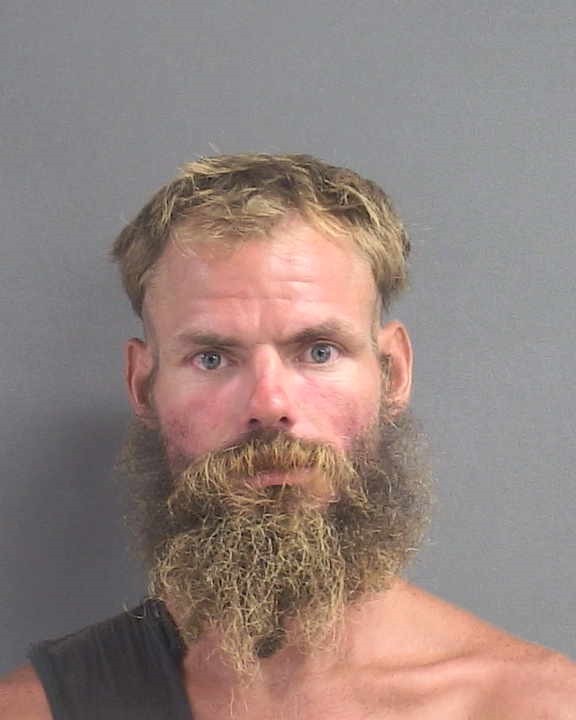 Booking photograph for JOSHUA MICHAEL MOORE