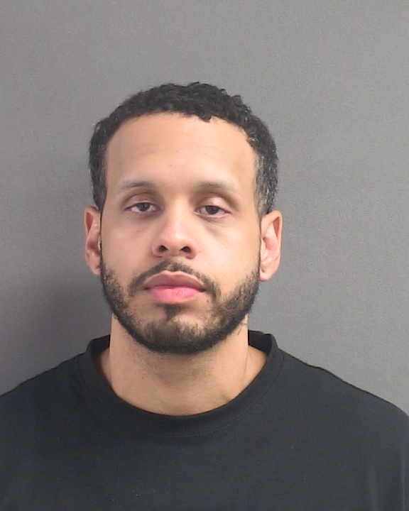 Booking photograph for AARON PARRILLA