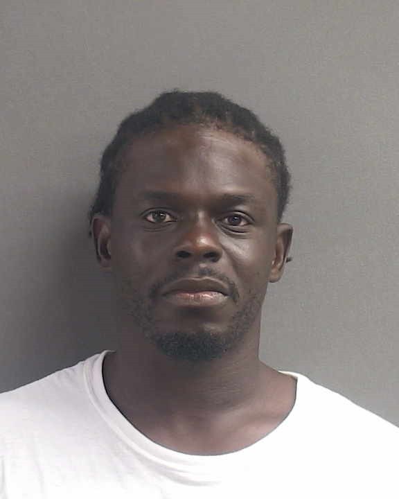 Booking photograph for CARLOS RAYNARD ROBERTS