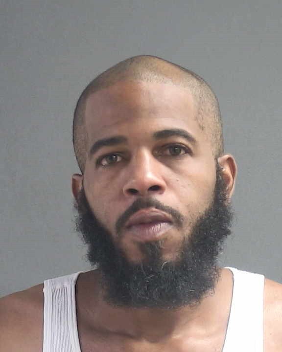 Booking photograph for TRUMAINE HANDY