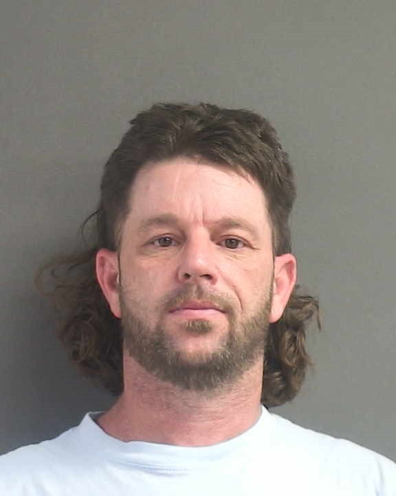 Booking photograph for JOSHUA ADAM GODKIN