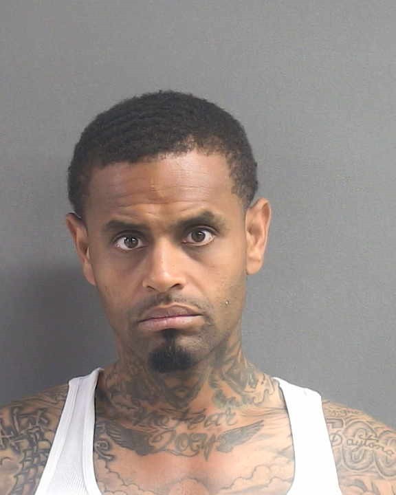 Booking photograph for CHRISTAN JAMAL RAINGE