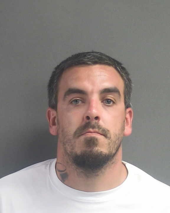 Booking photograph for JUSTIN RAYMOND GIBBS