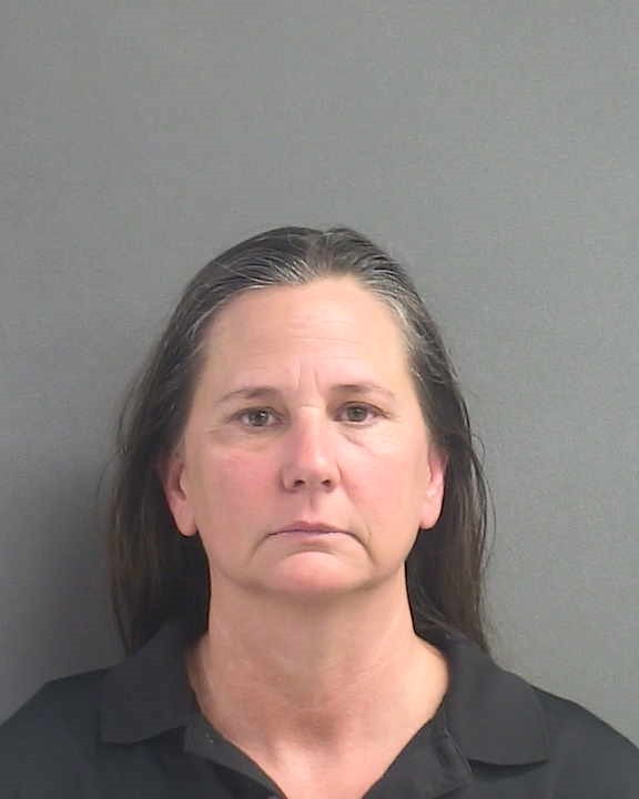 Booking photograph for JACKIE MINNICH HARRISON