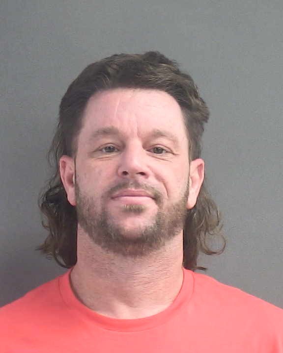 Booking photograph for JOSHUA ADAM GODKIN