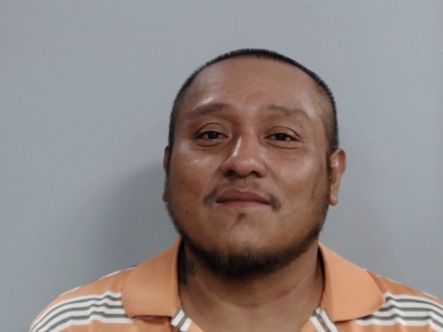 Booking photograph for SANTANA GERARDO REYES-